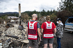 September 19, 2020. Gates, Oregon.
American Red Cross volunteers Sean and Kristen Flanagan speak with Virginia, in front of the home where she lived that burned down in the Oregon wildfires, in Gates, OR on Saturday September 19, 2020.
Photo by Scott Dalton/American Red Cross